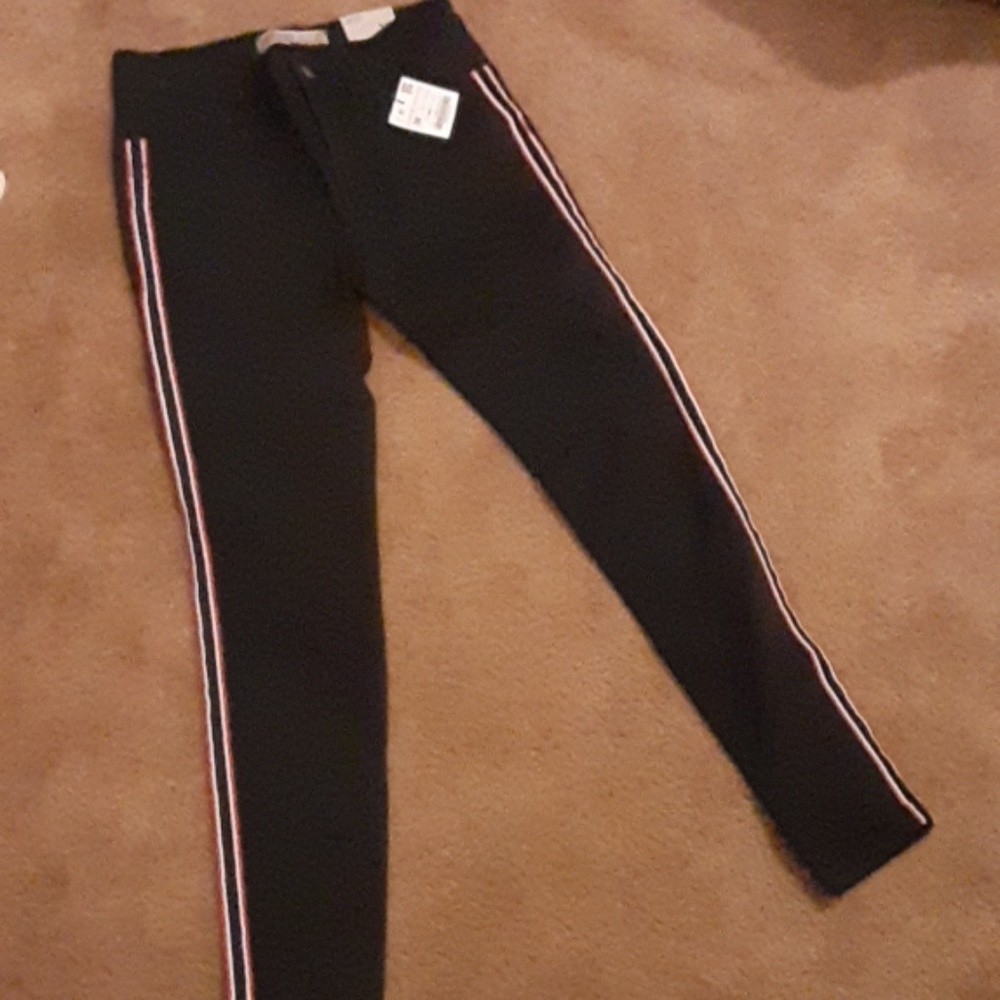 Zara Jean's with red & white strip on the side